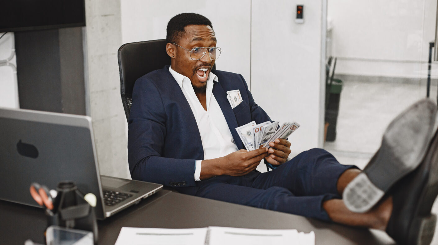 How Real Estate Creates Generational Wealth elegant african man in the office